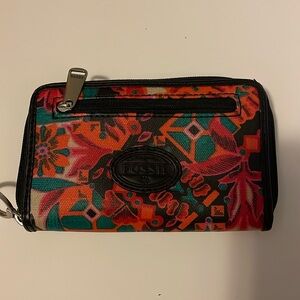 Fossil small wallet. Multi-color, gently used, good condition